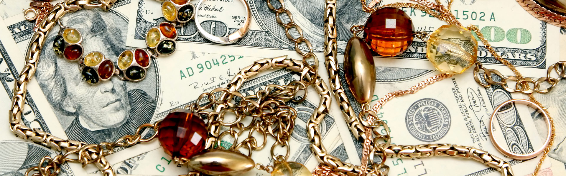 Collection of Dollar Bills and Jewelry